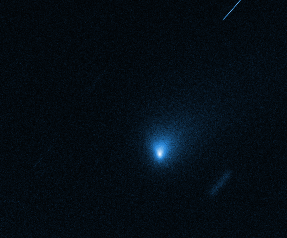 Figure 19: This is a time-lapse sequence compressing Hubble Space Telescope observations of comet 2I/Borisov, spanning a seven-hour period. As the second known interstellar object to enter our solar system, the comet is moving along at a breakneck speed of 110,000 miles per hour. To photograph the comet Hubble has to track it, like a photographer tracking a racetrack horse. Therefore, background stars are streaked in the exposure frames. An artificial satellite also crosses the field of view. Hubble reveals a central concentration of dust around an unseen nucleus [image credit: NASA, ESA and J. DePasquale (STScI)]