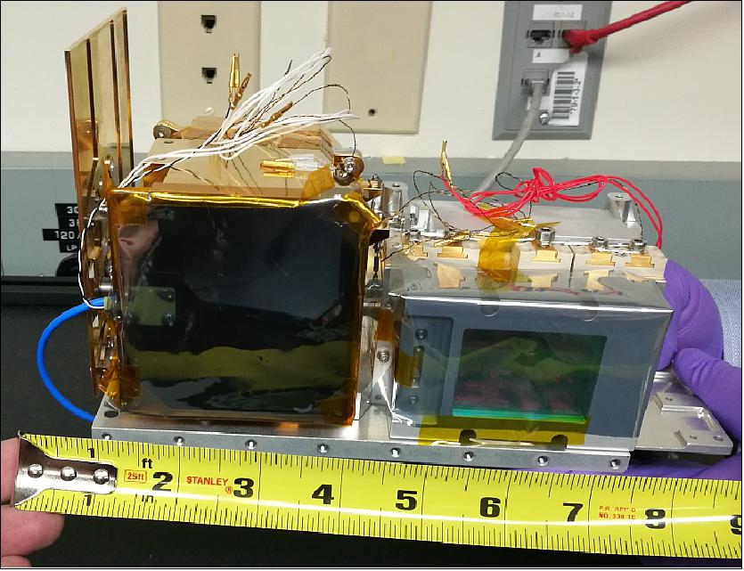 Figure 16: LF reflectometer optomechanical assembly (flight hardware). The receiver aperture and the laser package optical window are covered with a temporary clean static shielding sheet to protect the receiver mirror and the laser module’s optical window from particulates (image credit: LF collaboration)
