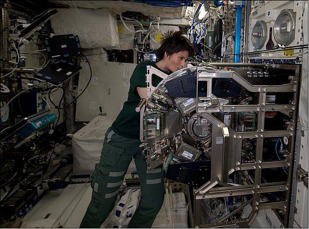 Figure 2: ESA astronaut Samantha Cristoforetti is working with ESA's Biolab facility in the Columbus laboratory on the Station for the Triplelux experiment (image credit: ESA, NASA)