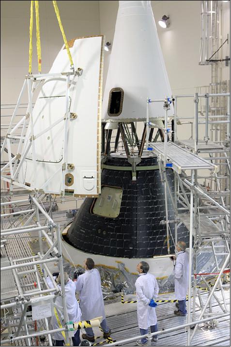 Figure 9: Technicians complete final assembly of NASA's first Orion spacecraft with installation of the close out panels on the Launch Abort System that smooth airflow (image credit: NASA, Kim Shiflett)