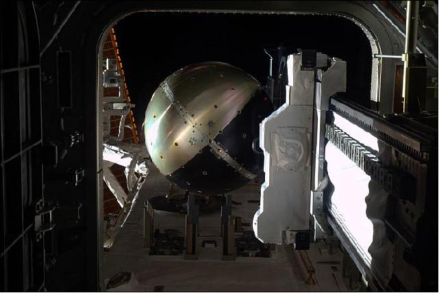 Figure 18: Photo of SpinSat mounted on the Cyclops slide table at the JEM airlock (image credit: NASA)