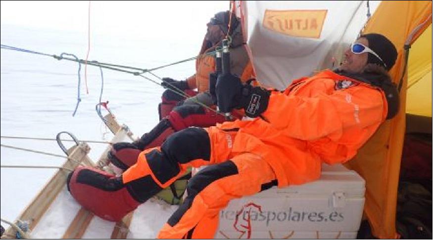 Figure 3: Photo of Inuit WindSled team members of 'Antarctica Unexplored 2018-2019' steering their sled (image credit: ESA)