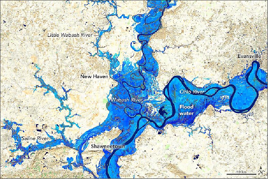 Figure 56: Composite image of OLI, showing floodwater on March 3, 2018, combined with an image acquired on November 7, 2017, that shows the typical widths of the rivers. It is false-color (bands 6-5-3) to better distinguish flooded areas (blue) from the surrounding land (tan), image credit: NASA Earth Observatory, image by Joshua Stevens, using Landsat data from the USGS. Story by Kathryn Hansen, with image interpretation by John Sloan/National Great Rivers Research and Education Center, and Kenneth Olson and Lois Morton/Iowa State University.