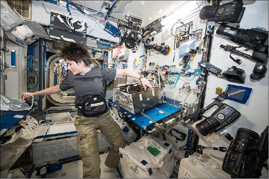 Figure 46: Samantha Cristoforetti on the ISS is working with equipment for the Airway Monitoring investigation (image credit: ESA/NASA, released on march 9, 2015)