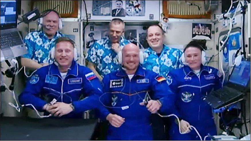 Figure 60: The newly-expanded Expedition 56 crew gathers in the Zvezda service module for a crew greeting ceremony with family, friends and mission officials in Moscow. In the front row from left are new Flight Engineers Sergey Prokopyev, Alexander Gerst and Serena Auñón-Chancellor. In the back row are Flight Engineer Oleg Artemyev, Commander Drew Feustel and Flight Engineer Ricky Arnold (image credit: NASA TV)