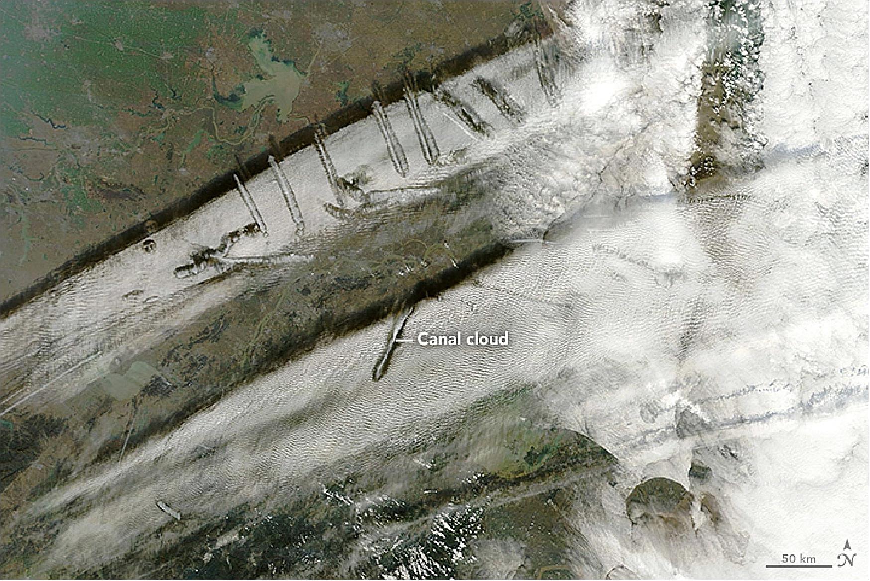 Figure 76: The MODIS instrument on Terra acquired this image on Dec. 28, 2016 over eastern China showing the display of canal clouds (image credit: NASA Earth Observatory, image by Joshua Stevens,caption by Kathryn Hansen)