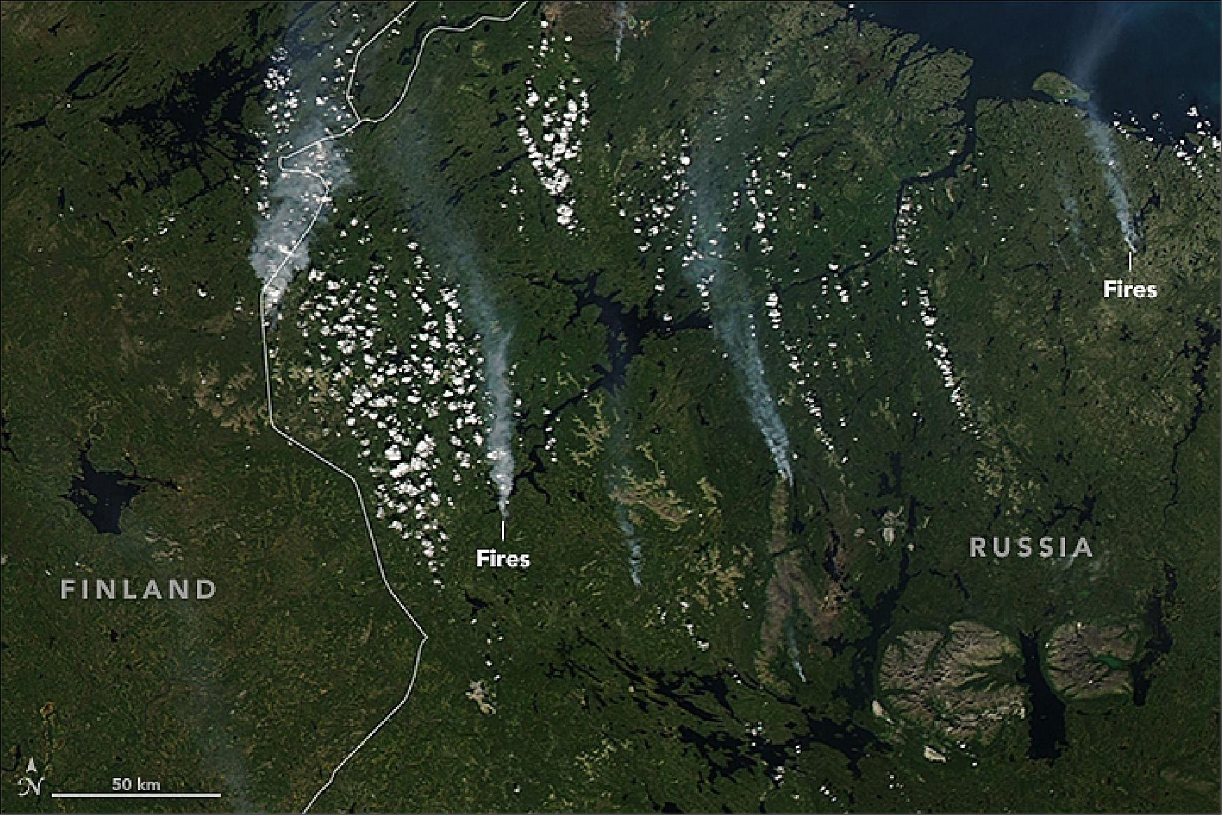 Figure 21: This natural-color image shows fires near the Russia-Finland border. The image was captured by MODIS on NASA’s Aqua satellite on July 20, 2018 (image credit: NASA Earth Observatory image by Lauren Dauphin and Joshua Stevens, using MODIS data from LANCE/EOSDIS Rapid Response and the Level 1 and Atmospheres Active Distribution System (LAADS). Story by Kasha Patel)