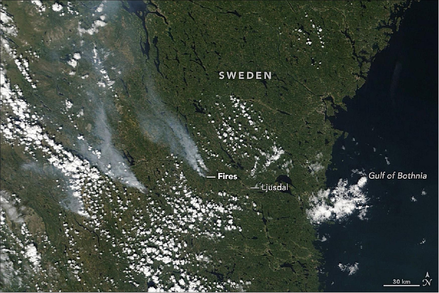 Figure 19: This natural-color image was acquired by MODIS on NASA’s Terra satellite on July 17, 2018. The largest fire was near Ljusdal, although Kårböle, Jämtland, and several towns have been evacuated due to fires. No fatalities have been reported so far. The Copernicus Atmosphere Monitoring Service forecast model shows an increase in fine particulate pollution above the fire-stricken areas this week (image credit: NASA Earth Observatory image by Lauren Dauphin and Joshua Stevens, using MODIS data from LANCE/EOSDIS Rapid Response and the Level 1 and Atmospheres Active Distribution System (LAADS). Story by Kasha Patel)