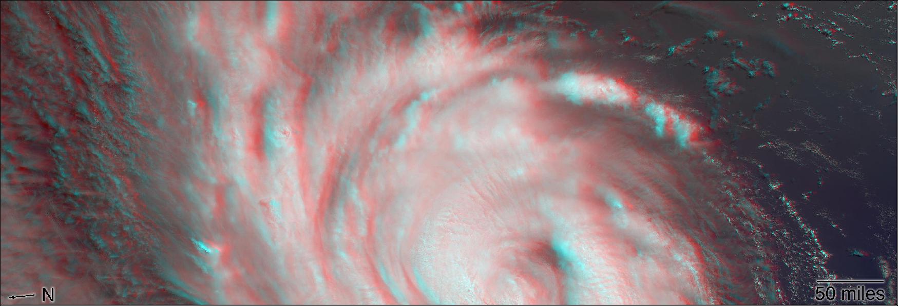 Figure 9: These data were captured during Terra orbit 99670. The MISR instrument, flying onboard NASA's Terra satellite, carries nine cameras that observe Earth at different angles. It takes about seven minutes for all the cameras to observe the same location. This stereo anaglyph shows a 3D view of Florence. You will need red-blue 3D glasses, with the red lens placed over the left eye, to view the effect. The anaglyph shows the high clouds associated with strong thunderstorms in the eyewall of hurricane and individual strong thunderstorms in the outer rain bands. These smaller storms can sometimes spawn tornadoes (image credit: NASA/JPL).