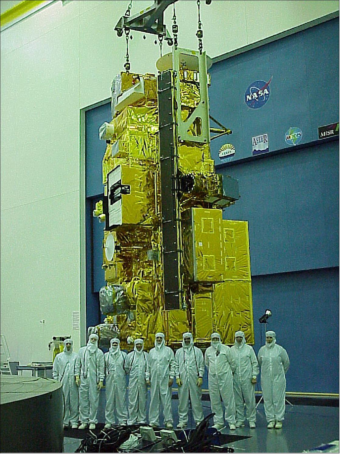 Figure 8: Terra’s test team stands in front of the satellite during its construction and testing phase (image credit: NASA, Dick Quinn)
