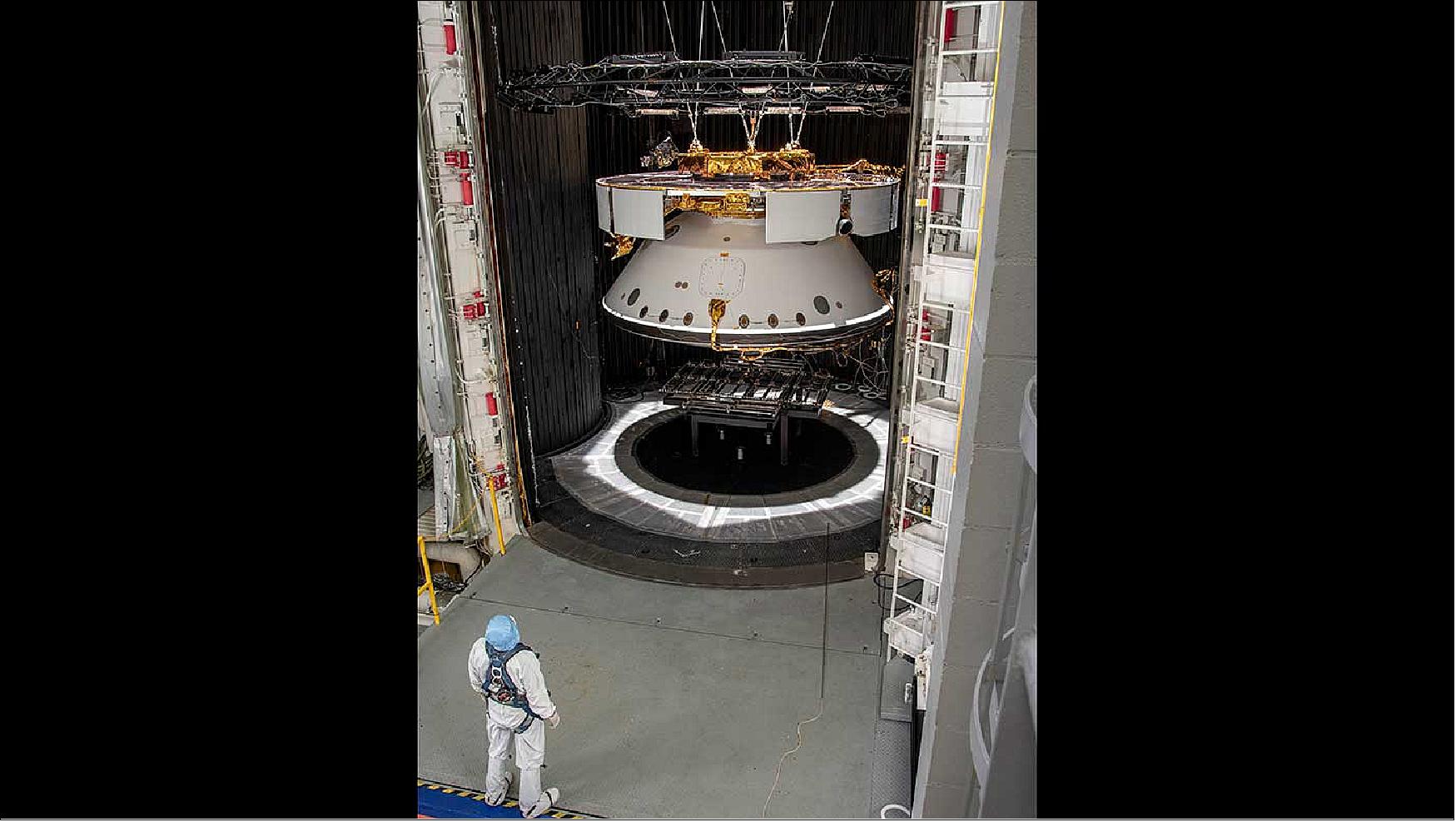Figure 11: An engineer inspects the completed spacecraft that will carry NASA's next Mars rover to the Red Planet, prior to a test in the Space Simulator Facility at NASA/JPL (image credit: NASA/JPL, Caltech)