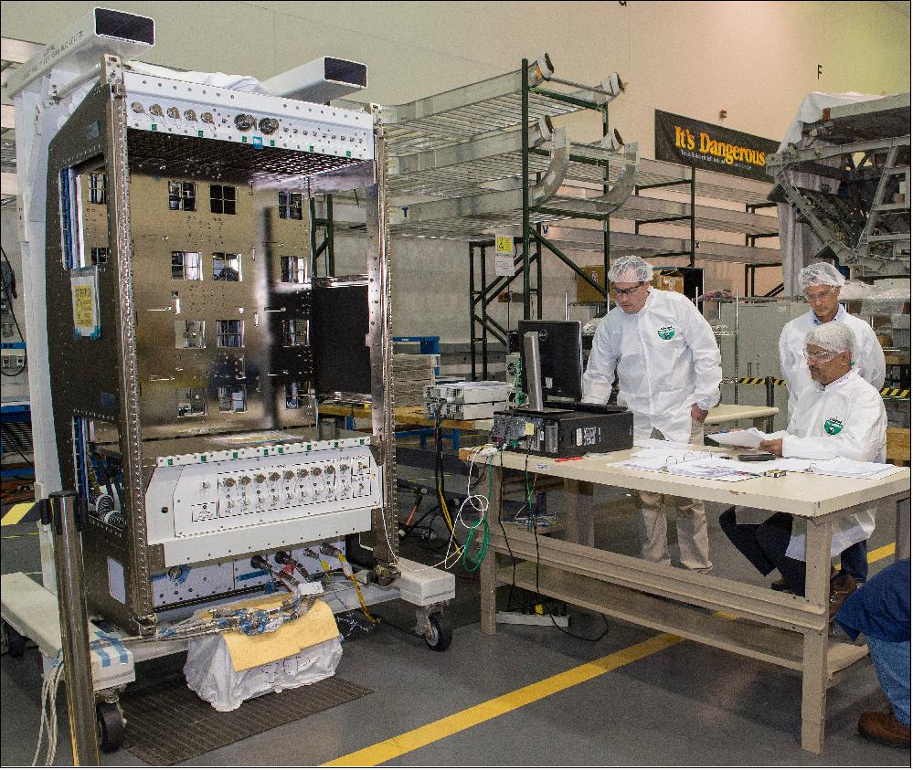 Figure 9: Boeing engineers conduct checkout testing of NASA Basic EXPRESS Racks, the last of which will be delivered to the International Space Station in May aboard the Japanese HTV-9 resupply flight. The racks, developed at NASA’s Marshall Space Flight Center in Huntsville, Alabama, have been integral to station science for 20 years — yielding a combined 85 years of rack operations. The 11th and final rack is expected to be in place and operational in fall 2020 (image credit: NASA/MSFC/Emmett Given)
