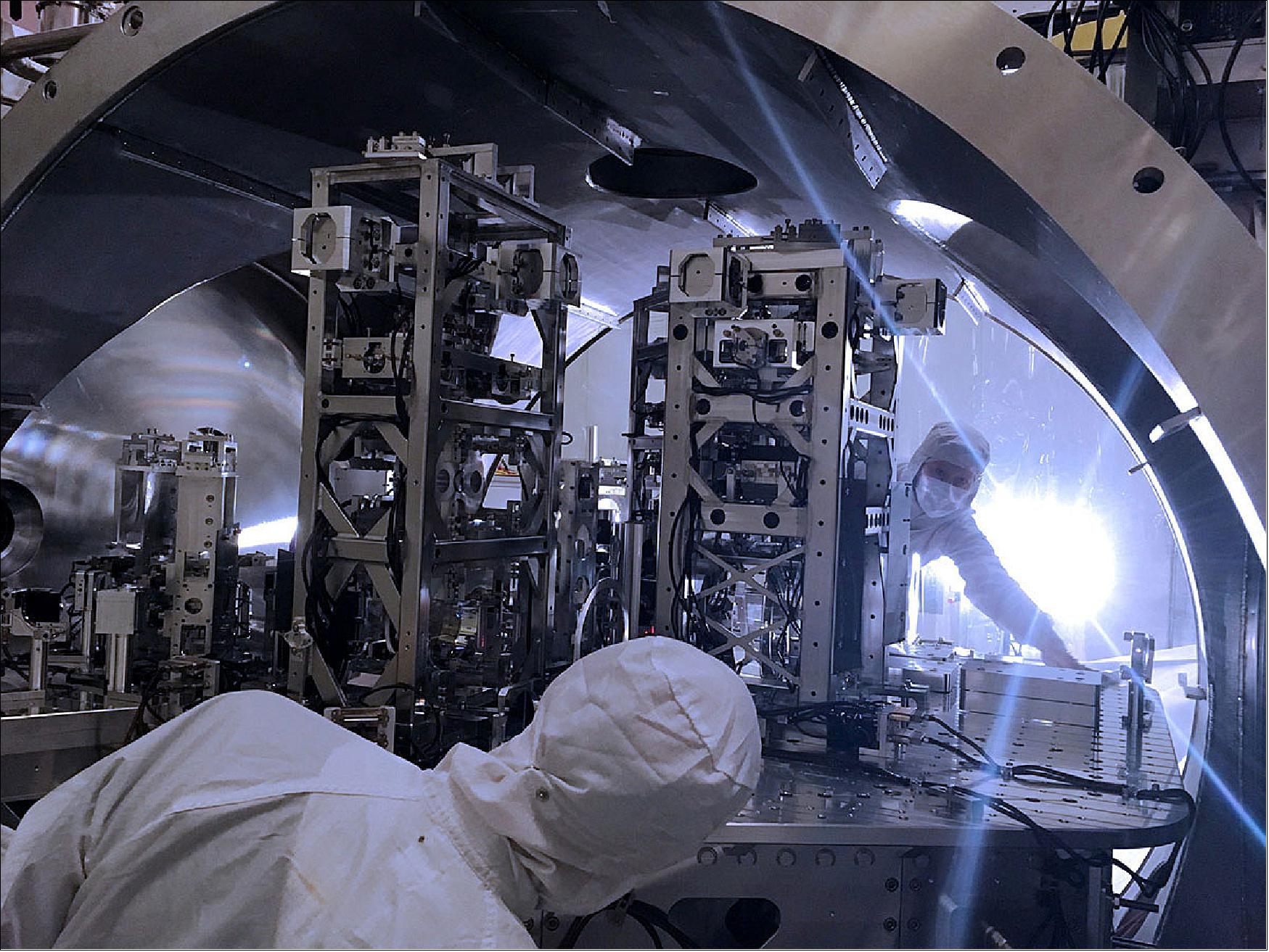 Figure 40: Engineers Hugh Radkins and Betsy Weaver at work inside the vacuum system of the detector at LIGO Hanford Observatory, Washington, USA, during recent hardware upgrades. With the upgrades complete, the two U.S. LIGO facilities, in partnership with the Virgo facility in Italy, are now poised to begin third observation run (image credit: LIGO/Caltech/MIT/Jeff Kissel)