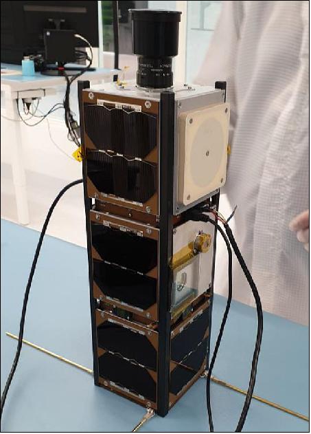 Figure 5: This photo shows the fully integrated satellite CubeL (3.4 kg). In the second unit on the right side, the aperture of OSIRIS4CubeSat can be seen, covered by an optical filter plate. The reduced and full functional tests were successfully completed (photo credit: DLR)
