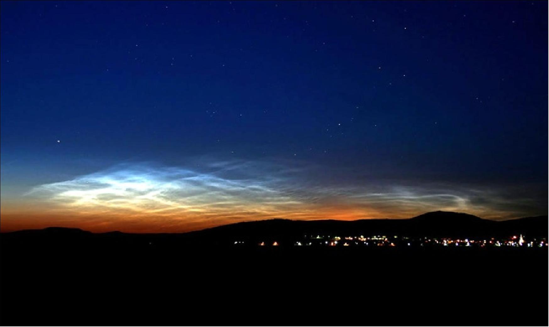 Figure 22: One of the first ground sightings of noctilucent clouds in the 2007 season over Budapest, Hungary on June 15, 2007 (image credit: NASA)